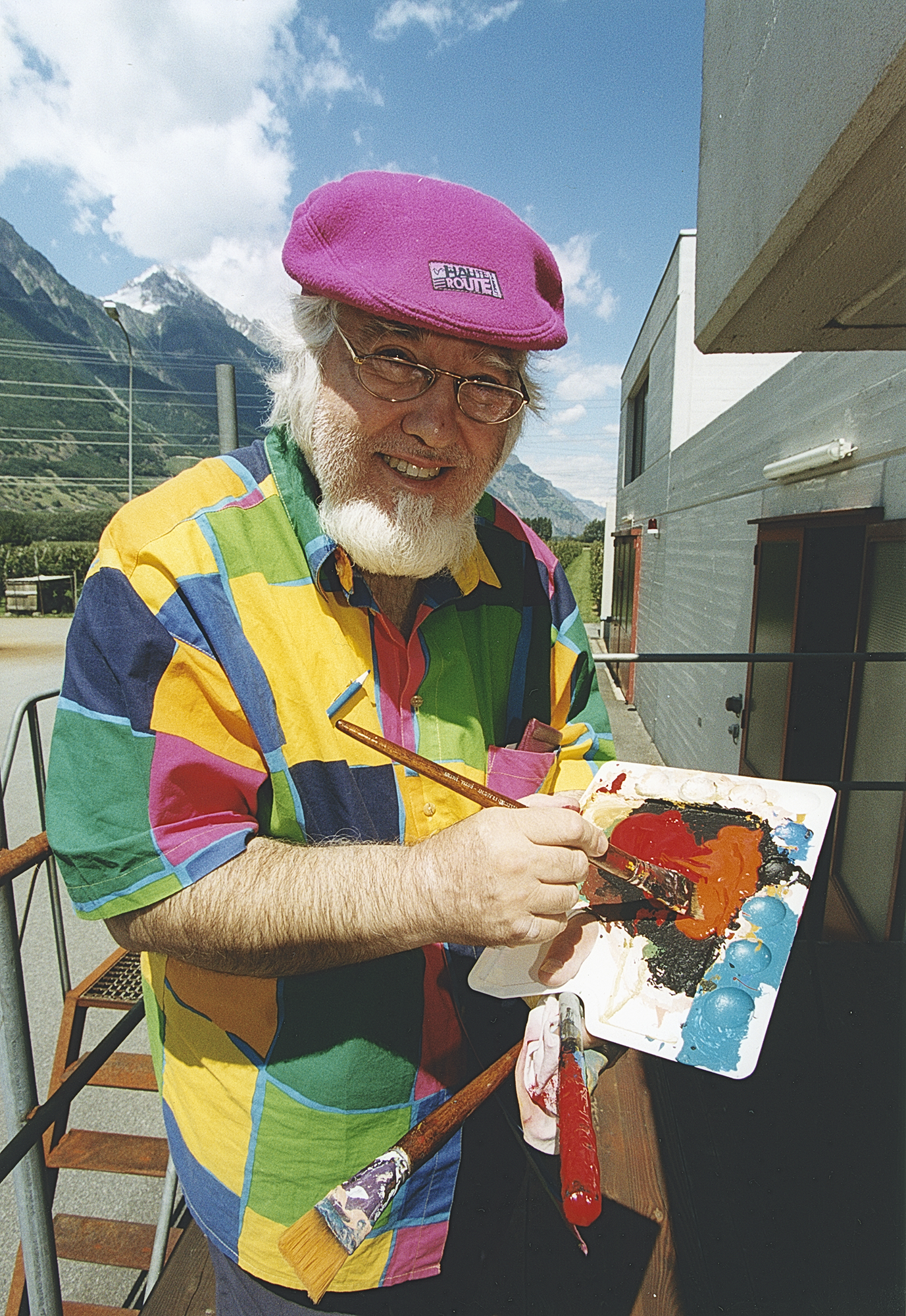 Jean-Paul Faisant travaillant sur sa fresque à la step de Martigny